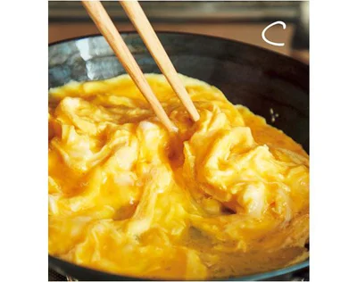 ご飯に2をのせ、1をかける