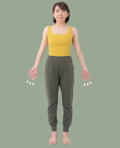 腕も壁につけて、手のひらは正面に向ける