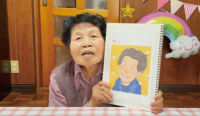 似顔絵もたくさん描いていただいて、孫が1冊にまとめてくれた