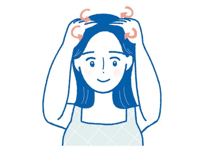 3. 両手の指を広げて生え際から頭頂部を、小さく「の」の字にゆっくりと動かして押し上げる