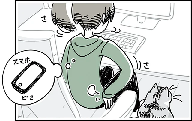 少し遠い場所にあるスマホ。取るのを諦めた矢先に猫が珍しいポーズをして