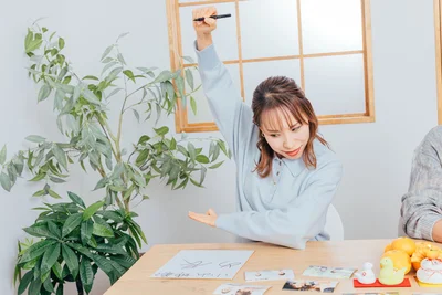 真面目に語る小山さんの横で、楽しげなみきさん