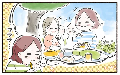 お弁当を食べながら公園でピクニック