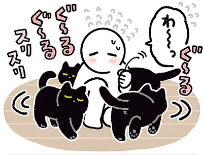 体をすりつけながら回る猫
