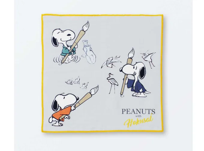 ガーゼ仕様のミニタオル。シックなグレーに、黄色の縁がアクセント。H25×W25cm。¥1,100