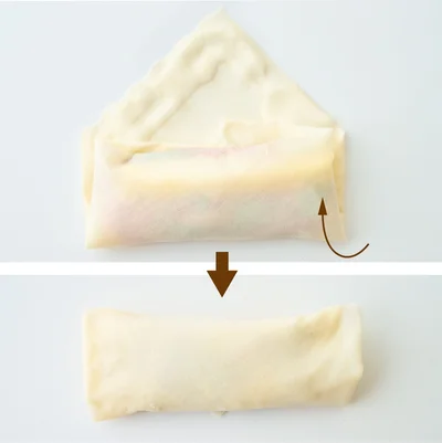 「基本の巻き方」③　手前から少しふんわりと巻き、巻き終わりをしっかり密着させる。