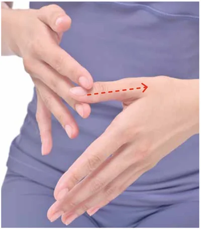 根元に向かって指をさする