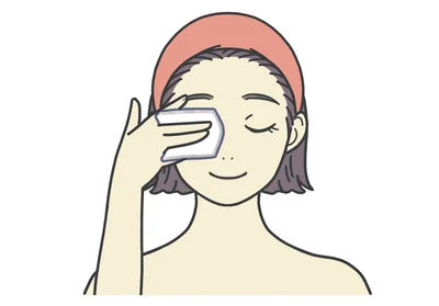 クレンジング1　ポイントリムーバーをコットンにのせ目もとにあてる