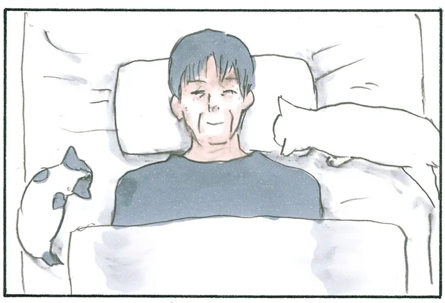 寒い日の楽しみ。布団に寝転び、猫たちを待つお父さんの幸せ時間