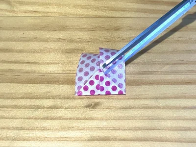 三角の延長線をカット（▶次へ）