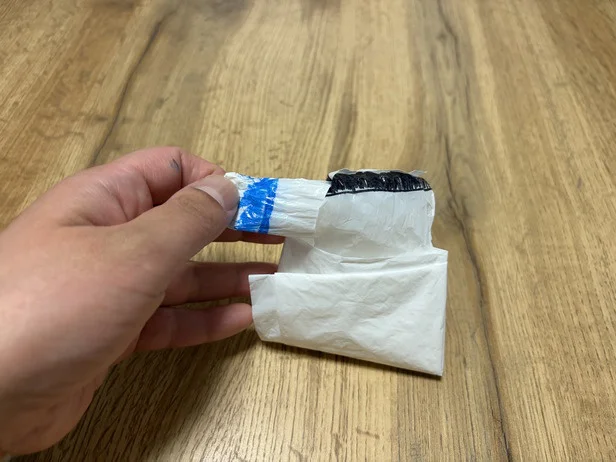 長い持ち手（青）を通す（▶次へ）