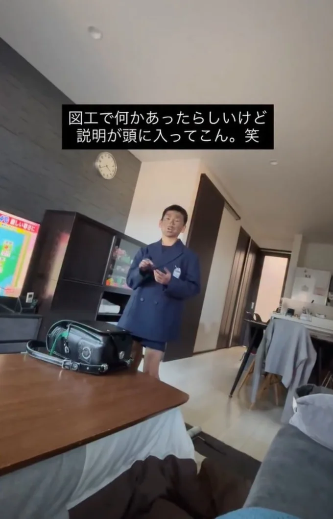 顔がまっ黒の息子さん（⇒次へ）