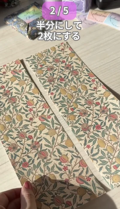 柄面を上にする▶右上の角を対角線に折り…（⇒次へ）