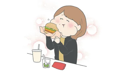 ハンバーガーを食べる義母