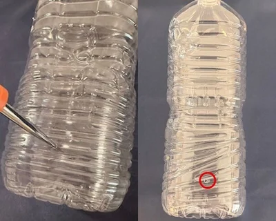 2ℓペットボトルの底から4㎝のところにキリで穴を開ける（▶次へ）