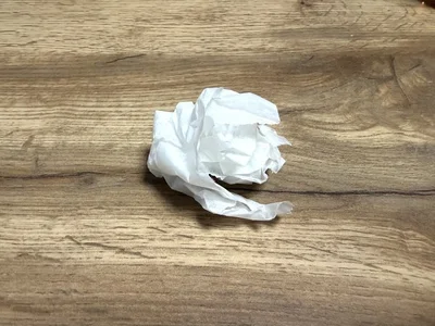 クッキングシートを丸める（▶次へ）