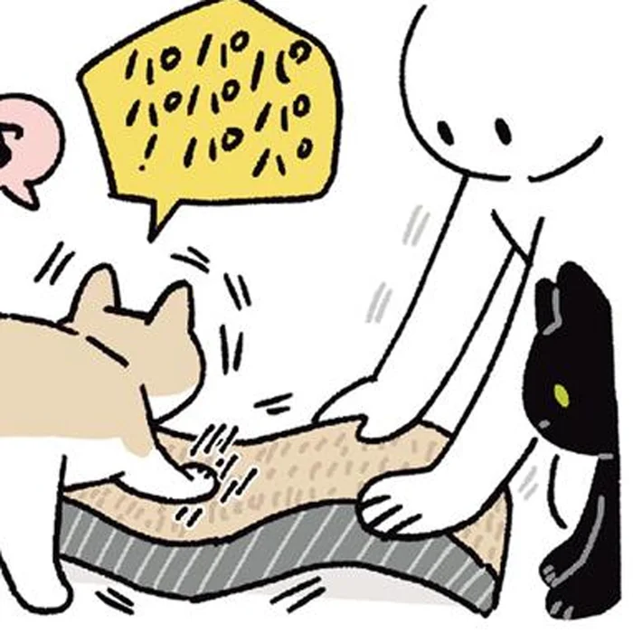 猫たちが夢中になれるように。動く爪とぎを押さえる飼い主