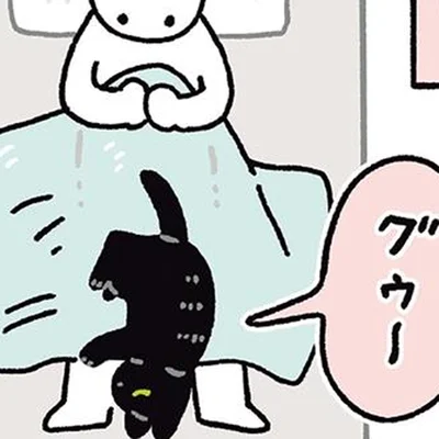 足の間で眠る黒猫ろん