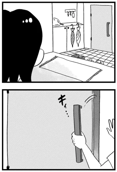 玄関のドアを開けて