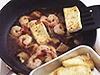 豆腐をくずさないように静かに混ぜる