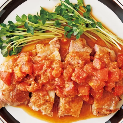 厚切り豚肉のトマトスタミナだれ